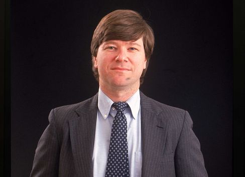 A person in a suit and tie

Description automatically generated