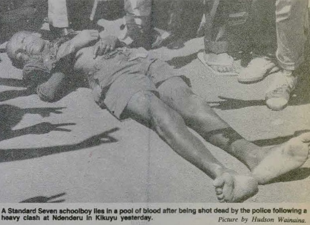 A person lying on the ground Description automatically generated