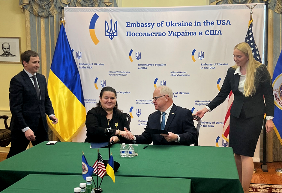 Gov. Tim Walz, center right, met with Ukrainian Ambassador to the United States Oksana Markarova, center left, on Wednesday to sign a letter of understanding establishing an agricultural partnership between Minnesota and a northern region in Ukraine called Chernihiv.