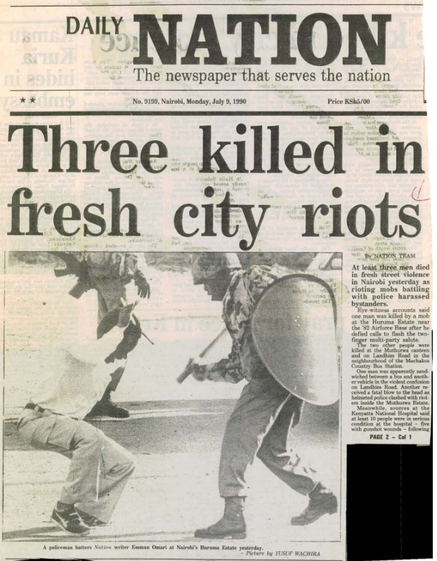 Newspaper with a newspaper headline
Description automatically generated