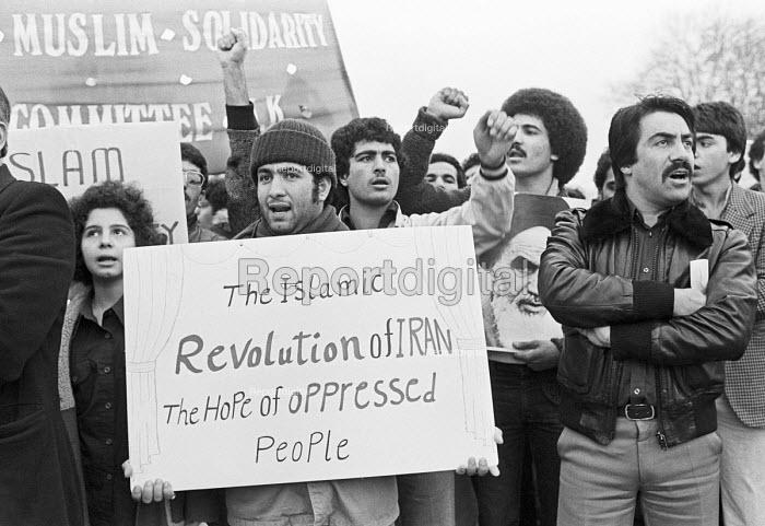 A group of people holding signs

Description automatically generated