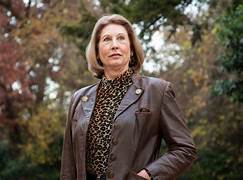 A person in a leather jacket

Description automatically generated