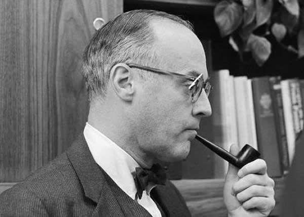 A person smoking a pipe
Description automatically generated