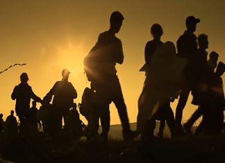 Human Migration Results From Economic Imperialism and Reflects System of Global Apartheid Dividing North and South, Says Brooklyn College Professor