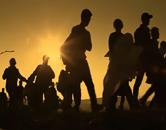 Human Migration Results From Economic Imperialism and Reflects System of Global Apartheid Dividing North and South, Says Brooklyn College Professor