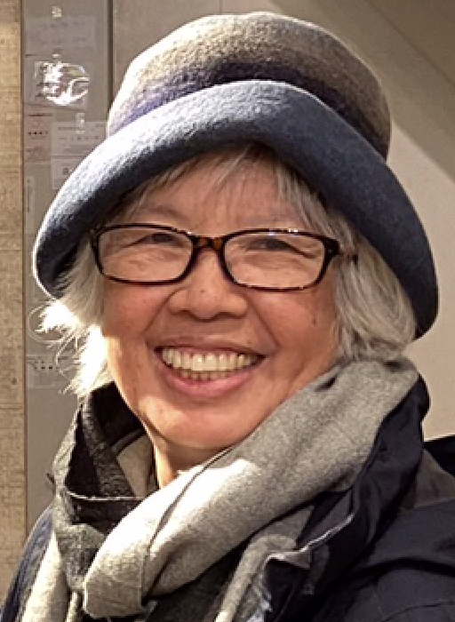 A person smiling for the camera

Description automatically generated