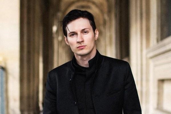 A person in a black jacket
Description automatically generated