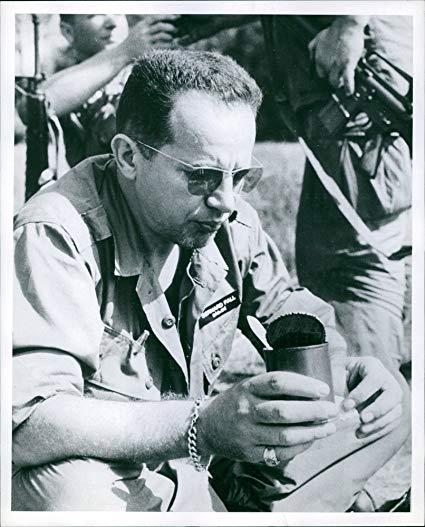 A person in a military uniform

Description automatically generated