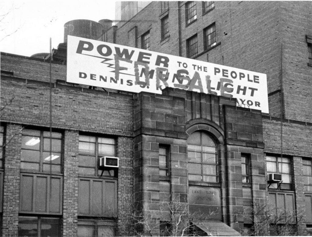 A sign on top of a building
Description automatically generated
