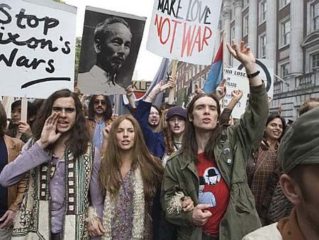 A group of people protesting

Description automatically generated