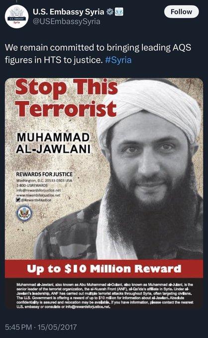 A person with a beard and turban
Description automatically generated