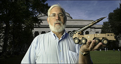 Ted Postol holds a model of a Scud missile launcher at MIT. After the Gulf War, the Patriot missile system won praise for shooting down Iraqi Scuds - until Postol spoke up.