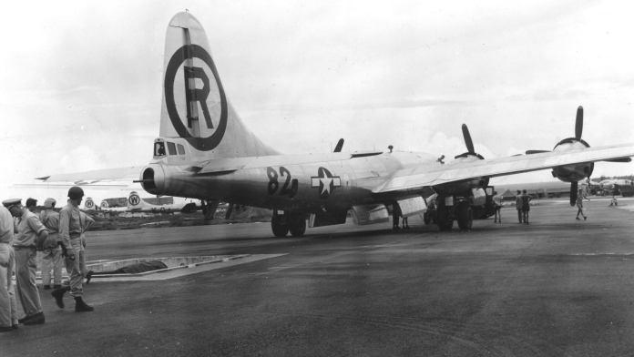 View of the B-29 Superfortress 'Enola Gay' as it is manouvered over the bomb pit on the North Field of Tinian airbase, North Marianas Islands, early August, 1945. The plane was loaded with an atomic bomb, codenamed 'Little Boy,' which it then dropped on the Japanese city of Hiroshima on August 6. (Photo by PhotoQuest/Getty Images)