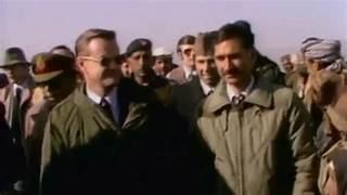 A group of men in coats

Description automatically generated