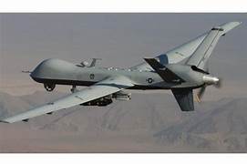 A military airplane flying in the sky

Description automatically generated