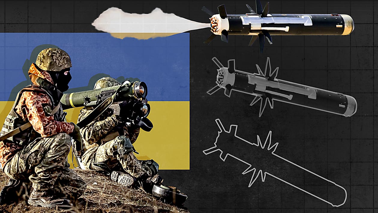 A soldier holding an object

Description automatically generated