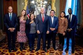 A group of people posing for a photo

AI-generated content may be incorrect.