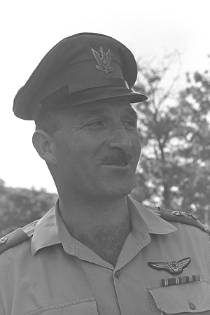 A person in a military uniform Description automatically generated