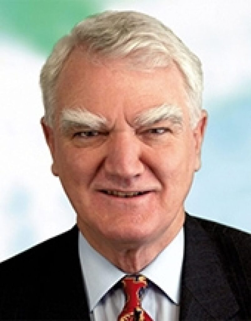 A person in a suit and tie

Description automatically generated