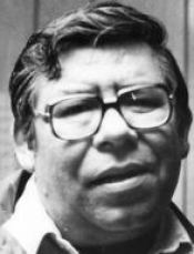 A person wearing glasses and looking at the camera

Description automatically generated