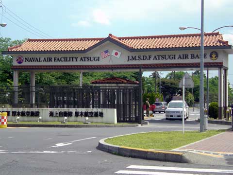 A gated entrance to an air force base

Description automatically generated