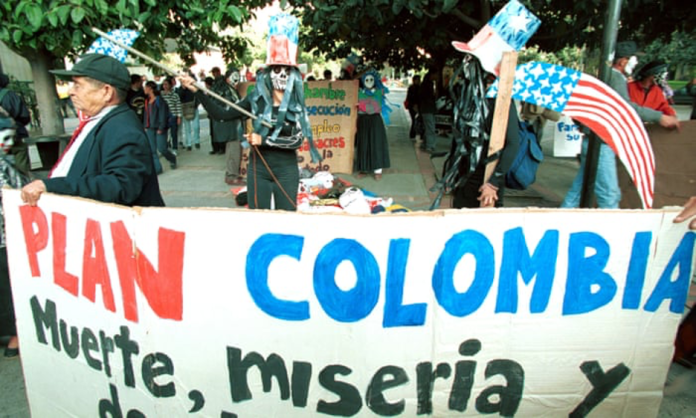 A group of people holding a sign

AI-generated content may be incorrect.