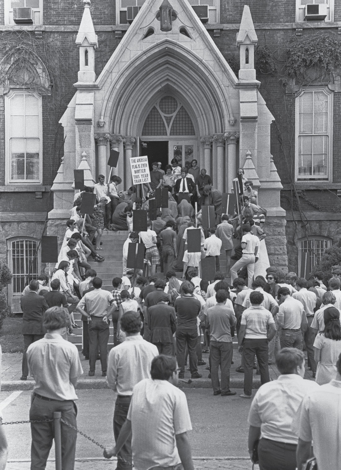 A group of people outside a church
Description automatically generated