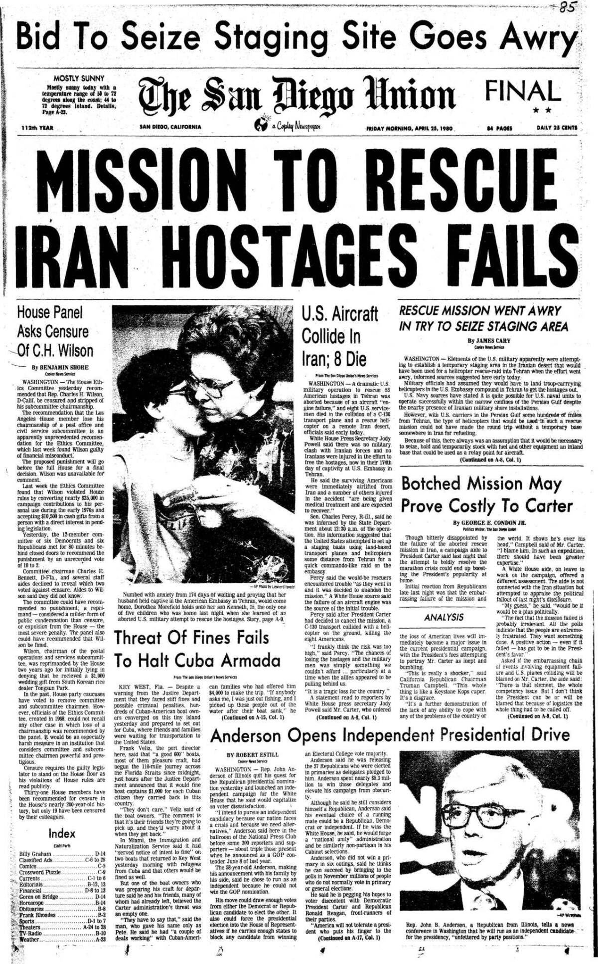 A newspaper with a couple of women kissing

Description automatically generated