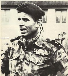 A person in military uniform

Description automatically generated