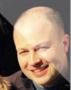 A person smiling for the camera
AI-generated content may be incorrect.