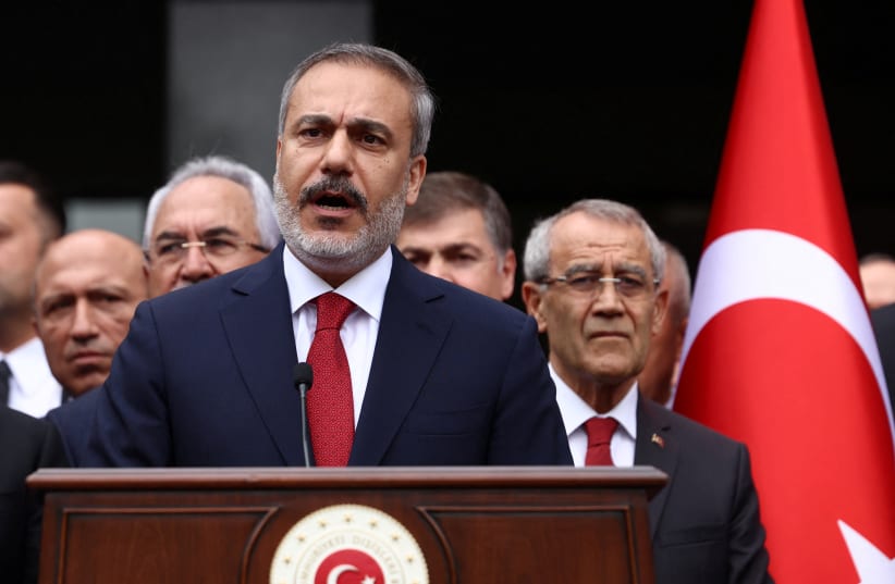 Turkey's newly appointed Foreign Minister Hakan Fidan speaks during a handover ceremony in Ankara, Turkey June 5, 2023. (photo credit: REUTERS/CAGLA GURDOGAN)