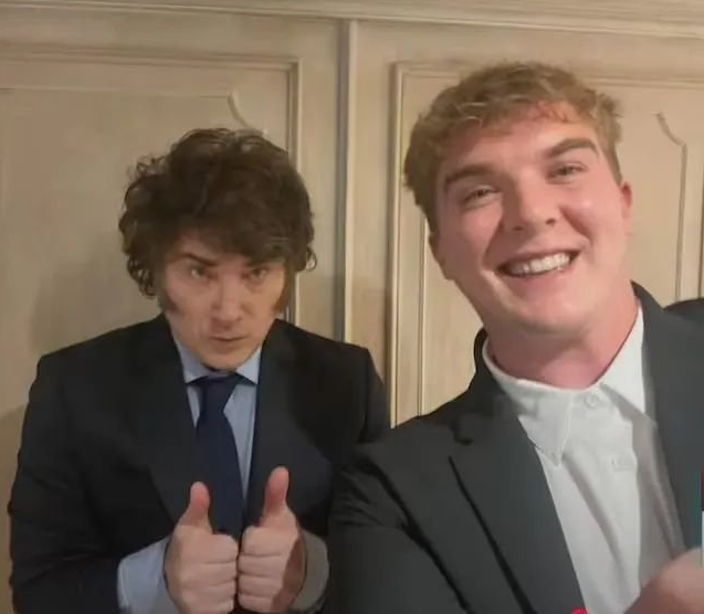 Two men in suits giving thumbs up

AI-generated content may be incorrect.