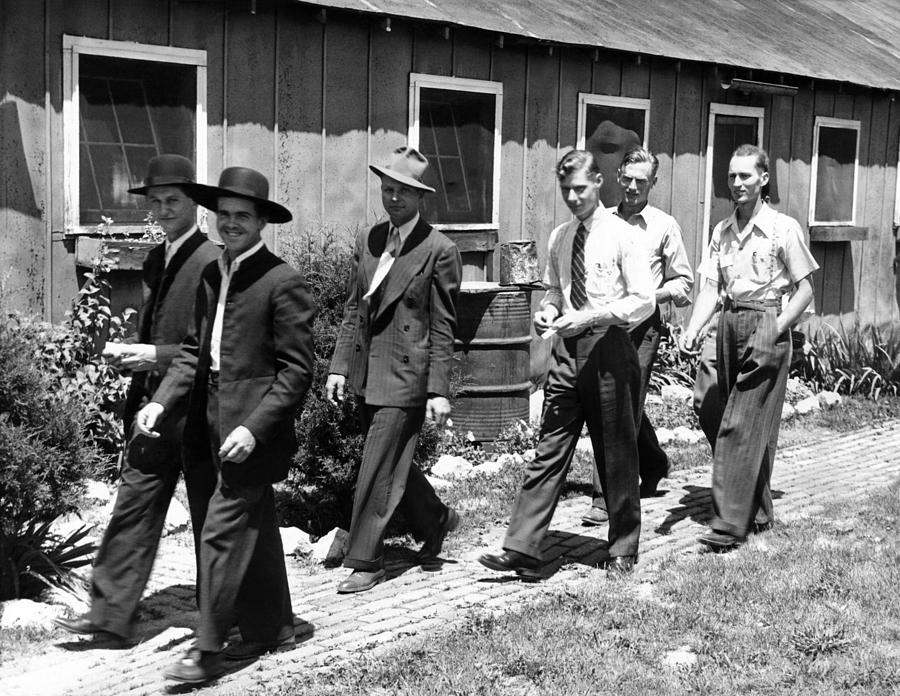 A group of men walking on a brick path
AI-generated content may be incorrect.