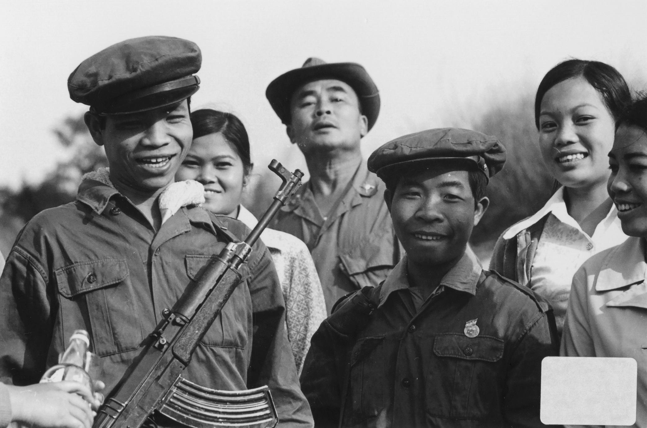 A group of people in military uniforms
Description automatically generated