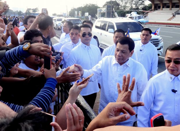 A group of people in white shirts

AI-generated content may be incorrect.