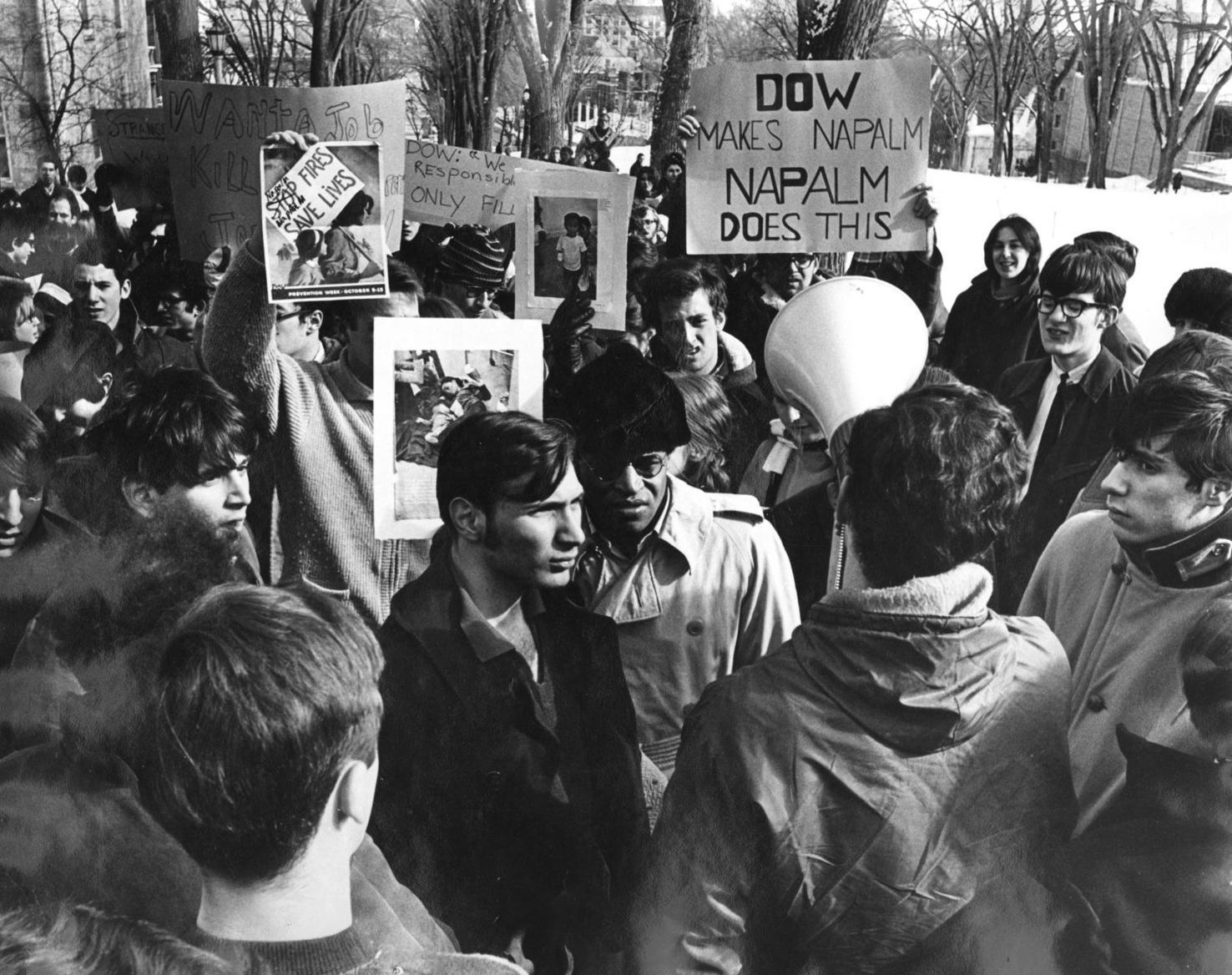 A group of people protesting

Description automatically generated