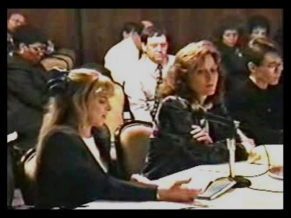 A group of people sitting at a table
AI-generated content may be incorrect.