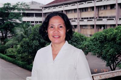 A person in a white coat

Description automatically generated