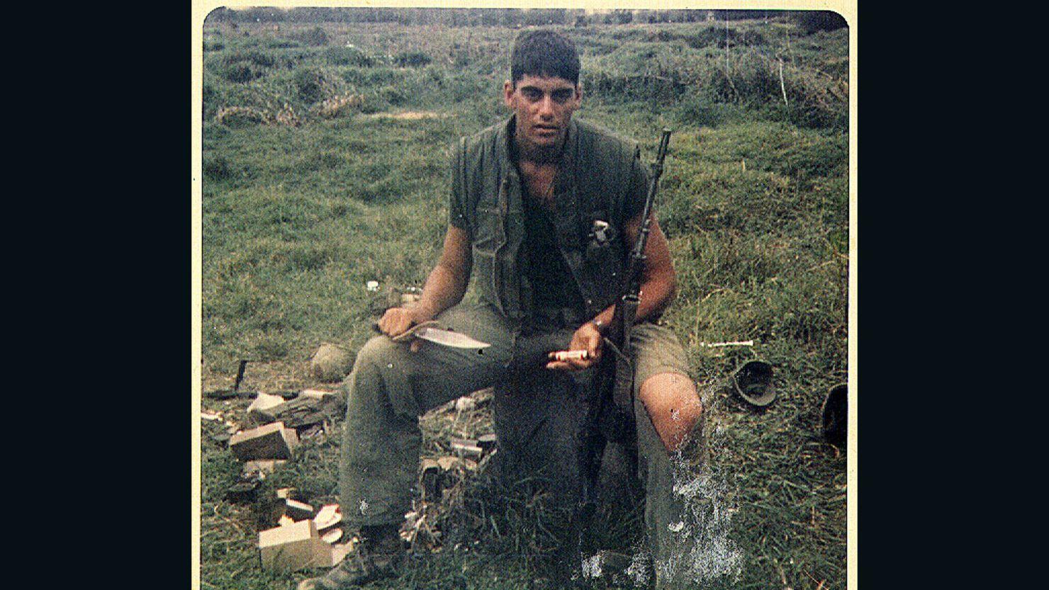 Scott Camil pictured in a cemetery in Dai Loc, Vietnam in 1967