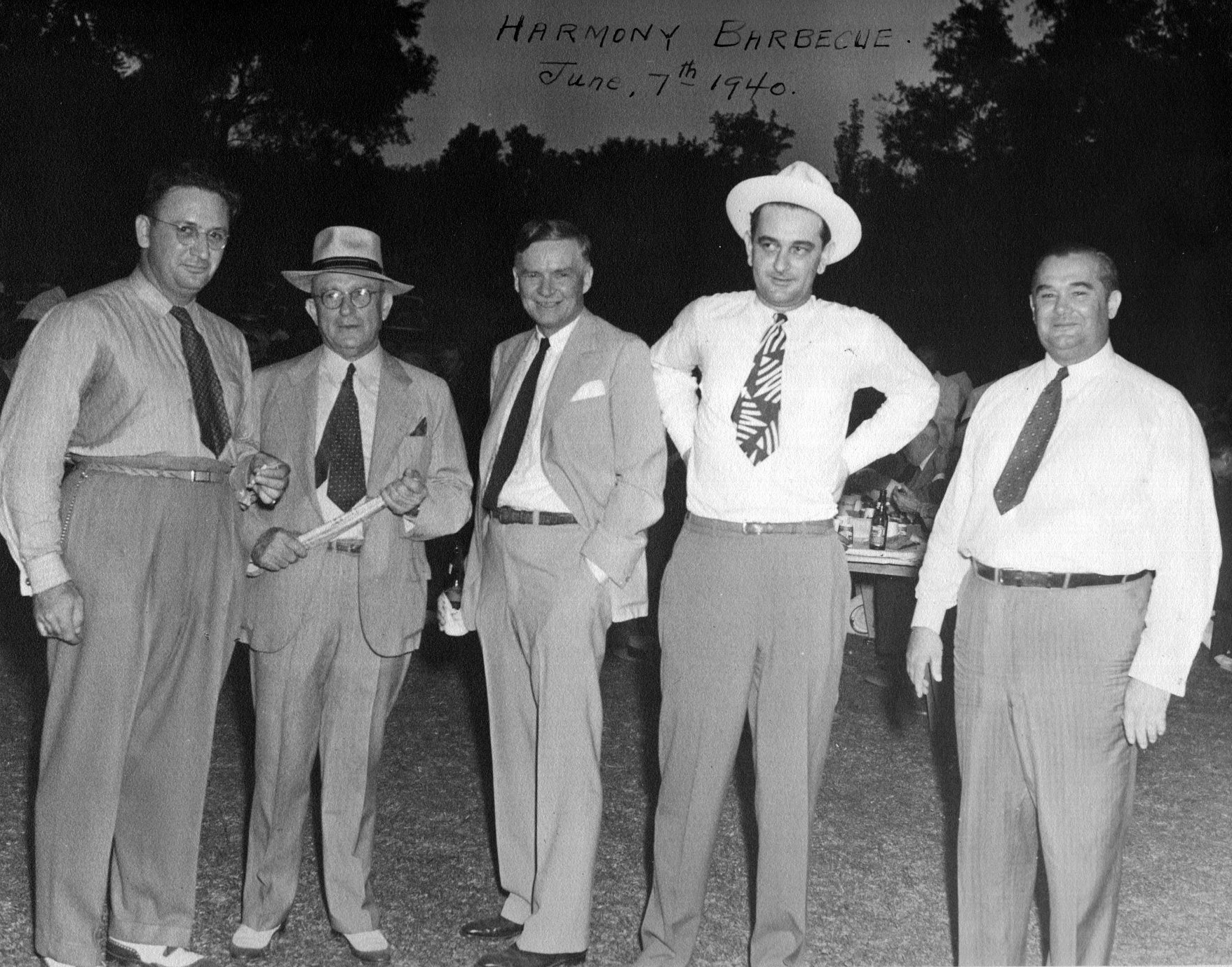 A group of men in suits

Description automatically generated