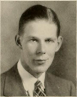 A person in a suit and tie
Description automatically generated