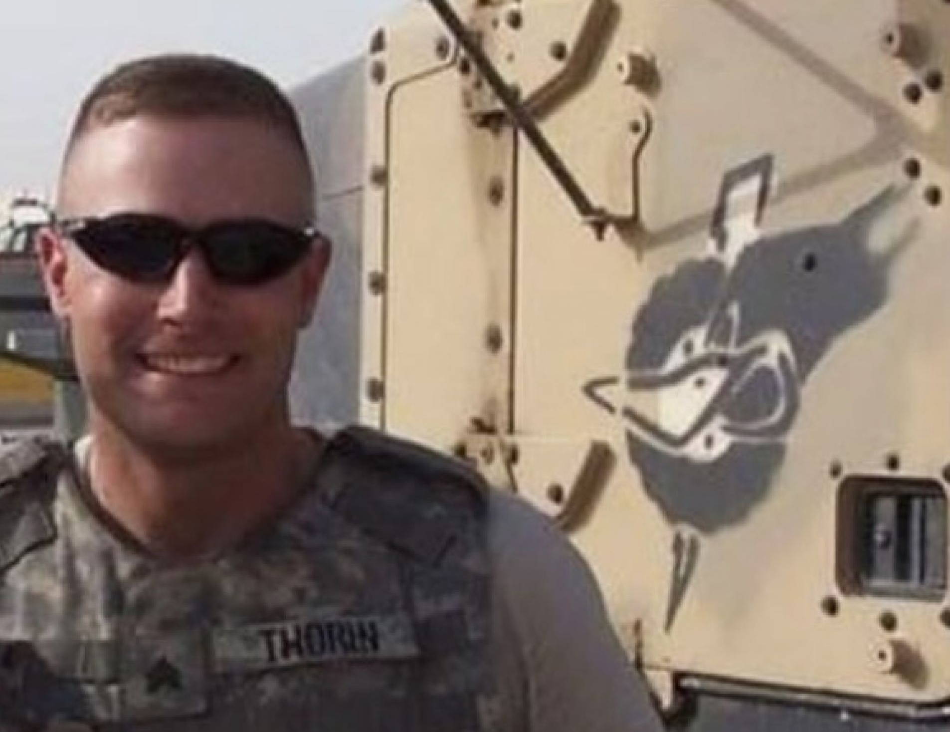 A person in military uniform

AI-generated content may be incorrect.