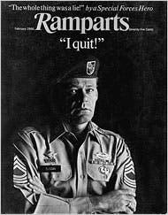 A person in military uniform with arms crossed

Description automatically generated