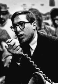 A person speaking into a telephone

Description automatically generated
