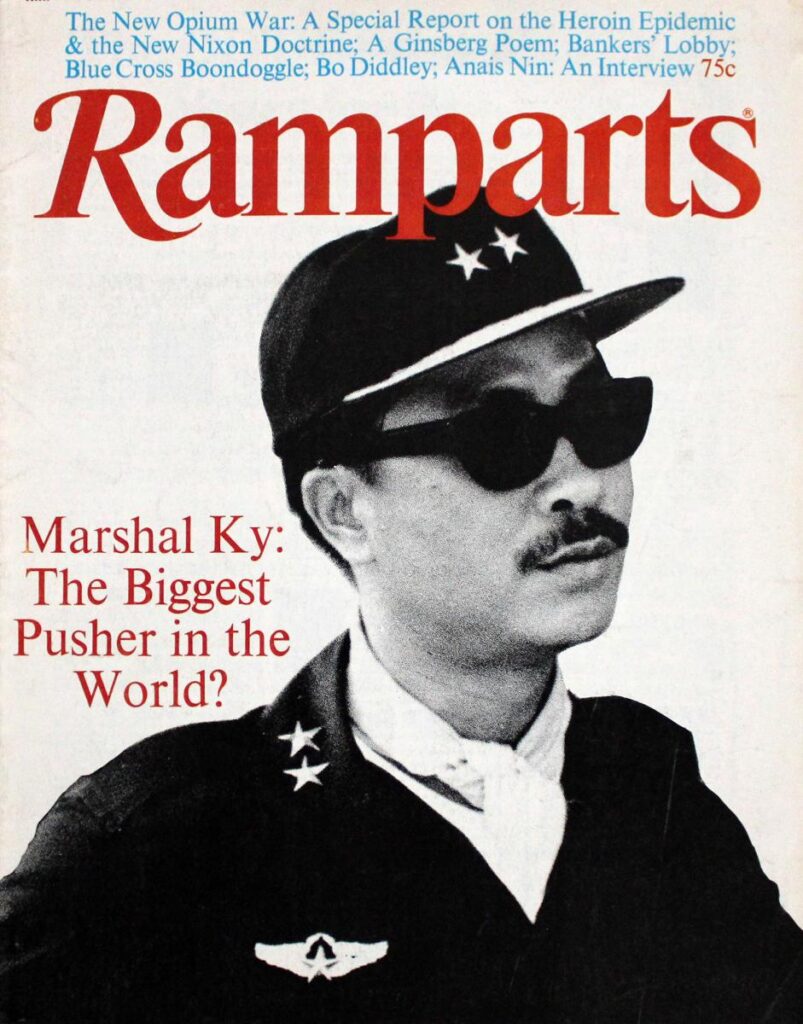A person wearing a hat and sunglasses

Description automatically generated