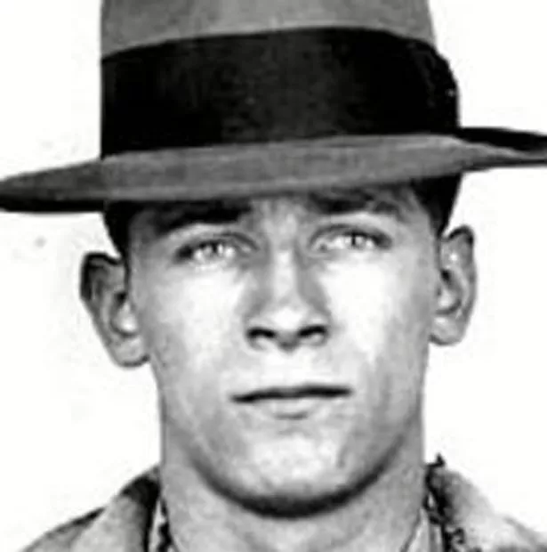 A person wearing a hat
Description automatically generated