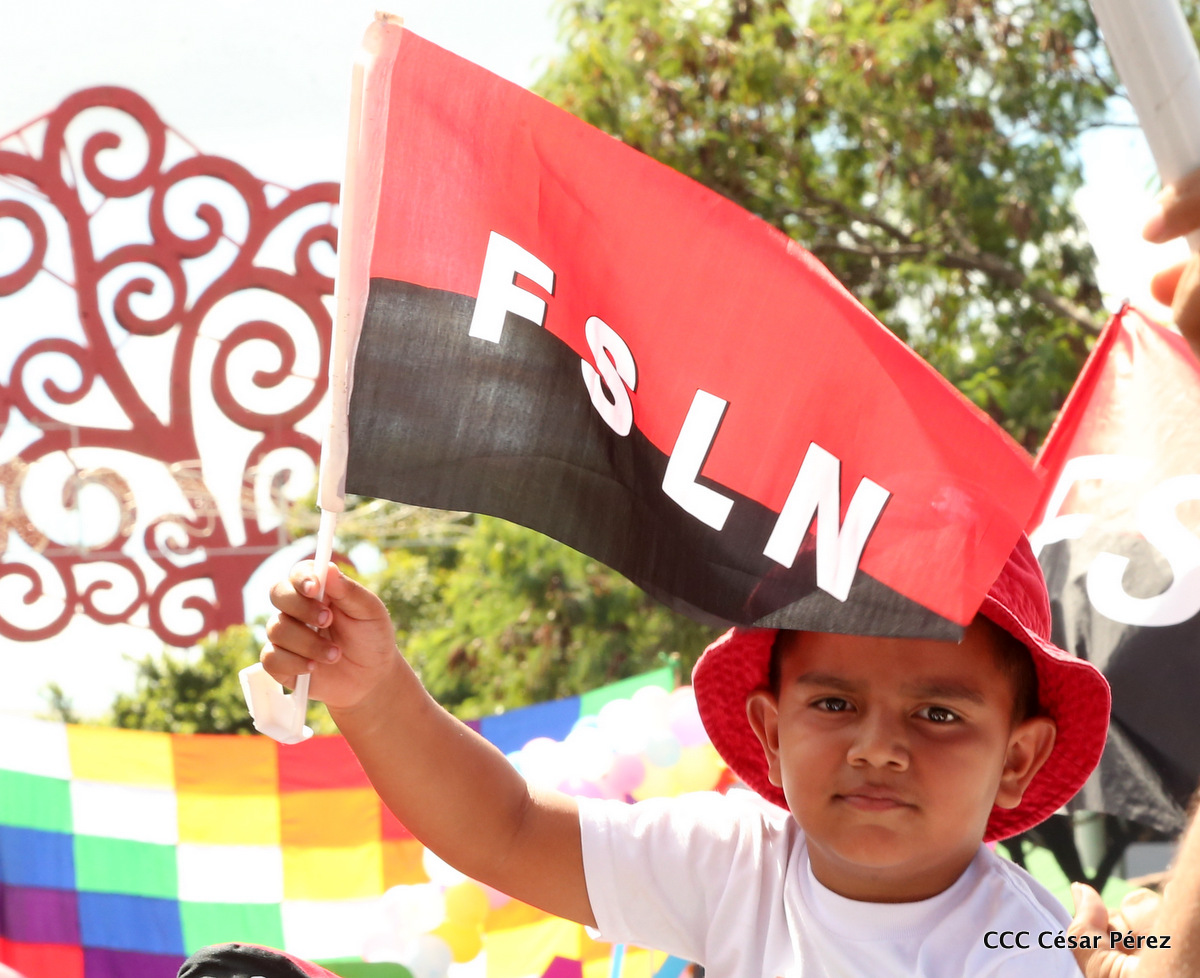 A child holding a flag

AI-generated content may be incorrect.