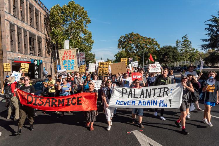 A group of people holding signs
AI-generated content may be incorrect.
