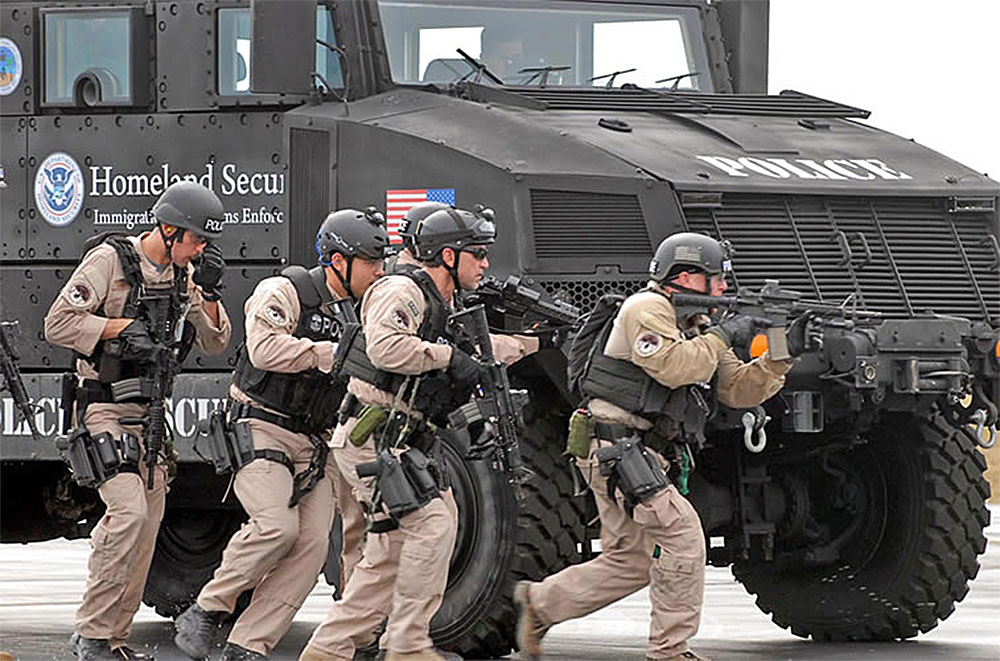 A group of police officers with guns
AI-generated content may be incorrect.