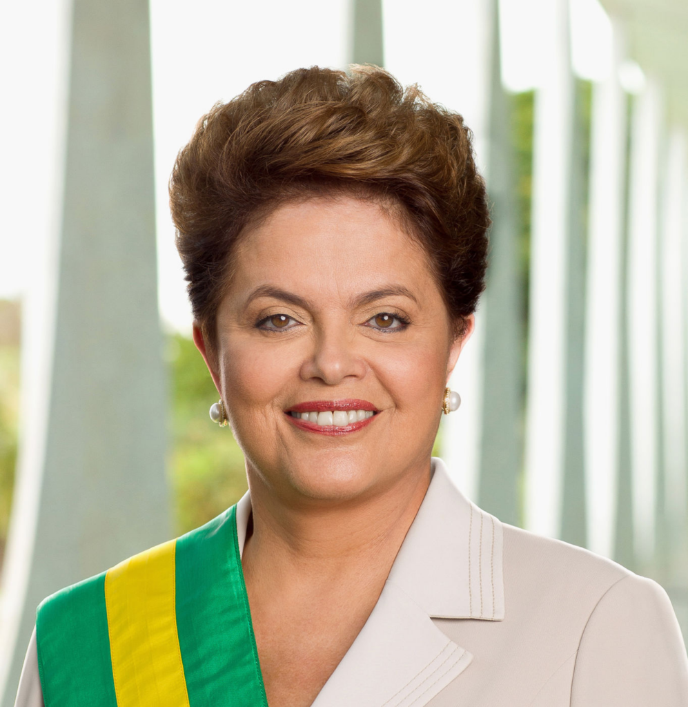 A person smiling with a green and yellow sash

AI-generated content may be incorrect.
